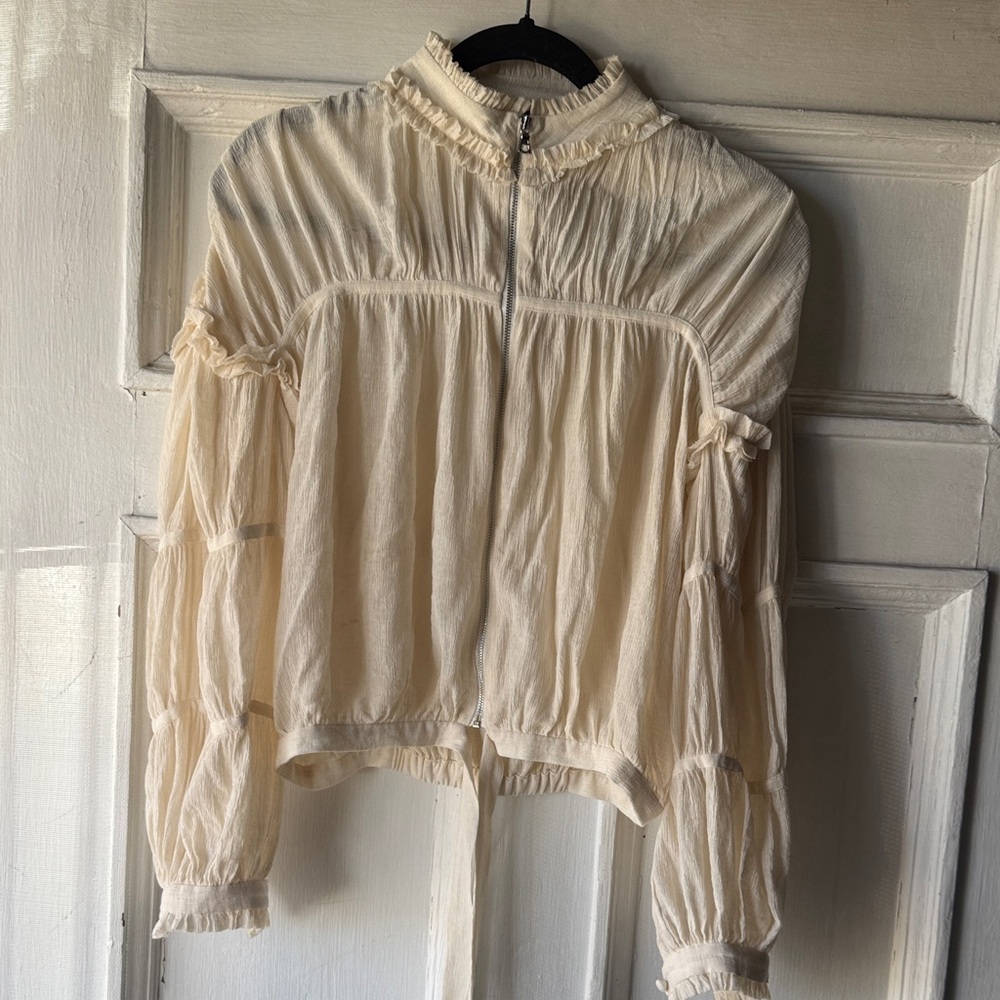 Alexis Cream Ruffled Blouse